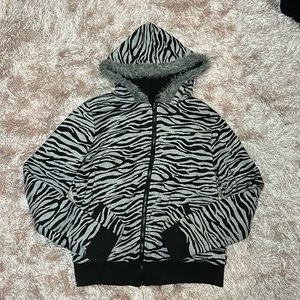 Fluffy reversible zebra zip-up hoodie
